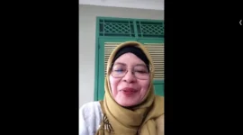 Asisten Pemkesra Setda Kota Depok, Diah Sadiah saat memberikan sambutan pada acara Forum Renja DP3AP2KB melalui Zoom Meeting, Kamis (26/02/26). (Foto: tangkapan layar/ Diskominfo Depok).