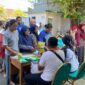 Puluhan warga rela mengantre panjang dalam Gerakan Pangan Murah di halaman Dispaperta Batang, Kabupaten Batang.